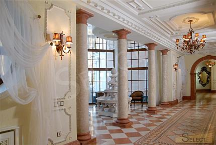 Luxurious palace in classical style with a lake